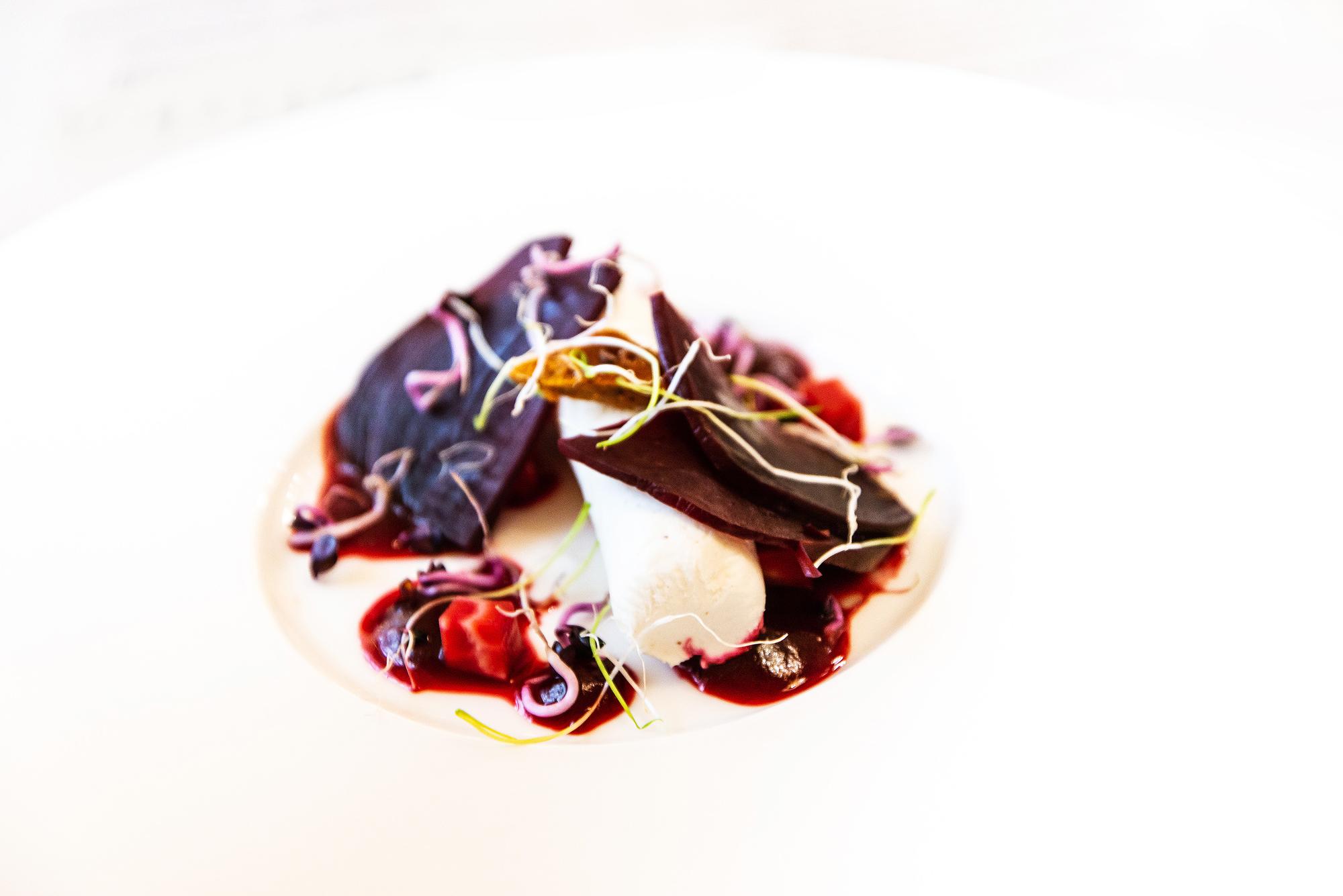 Plated course on ceramic with herbs