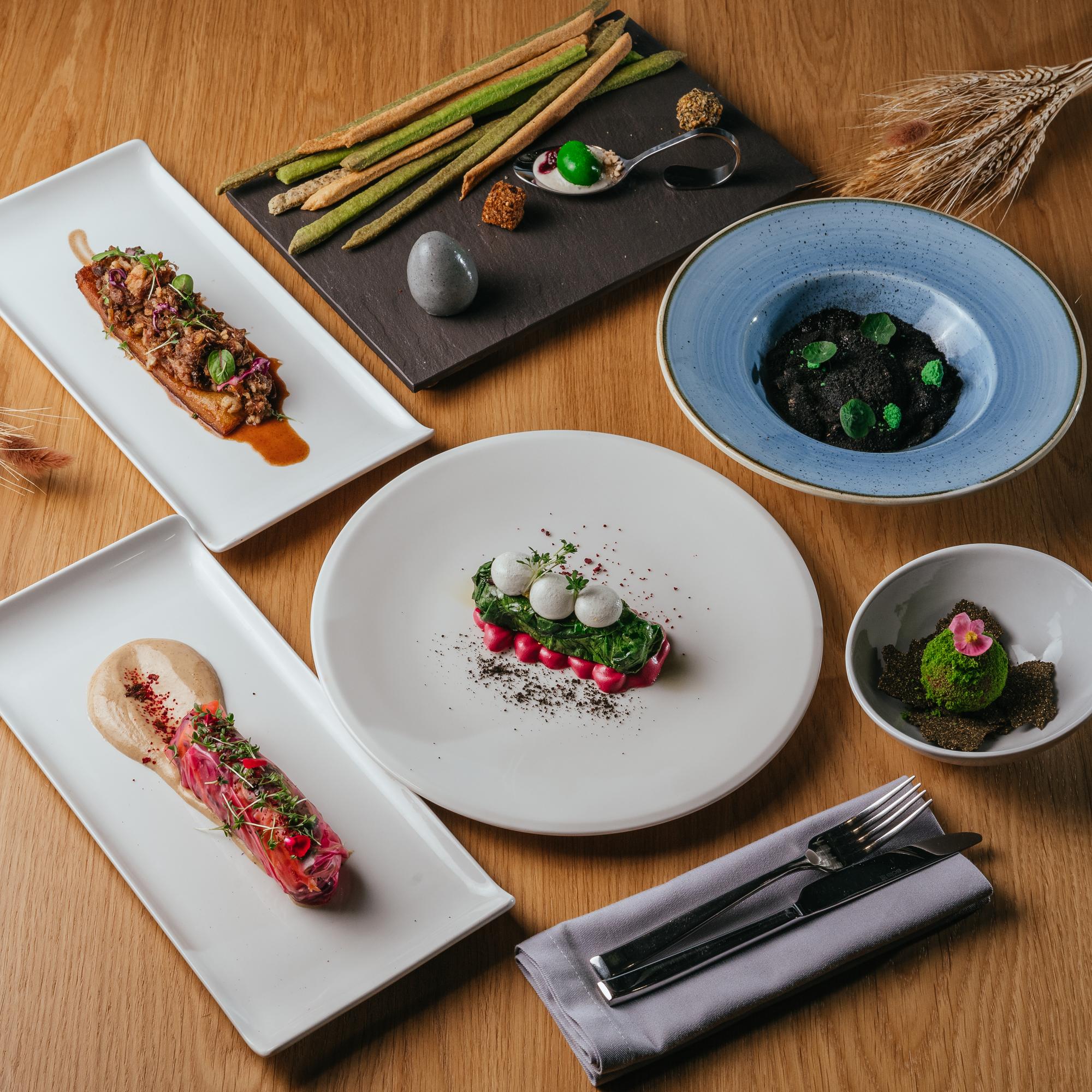 Table with plated dishes representing plans
